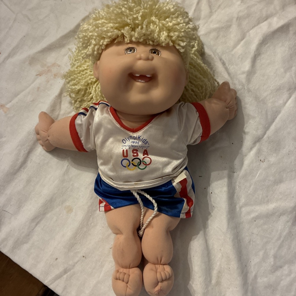 1996 OlympiKids Cabbage Patch Kid Doll With 2 Teeth Yellow Hair Brown Eyes